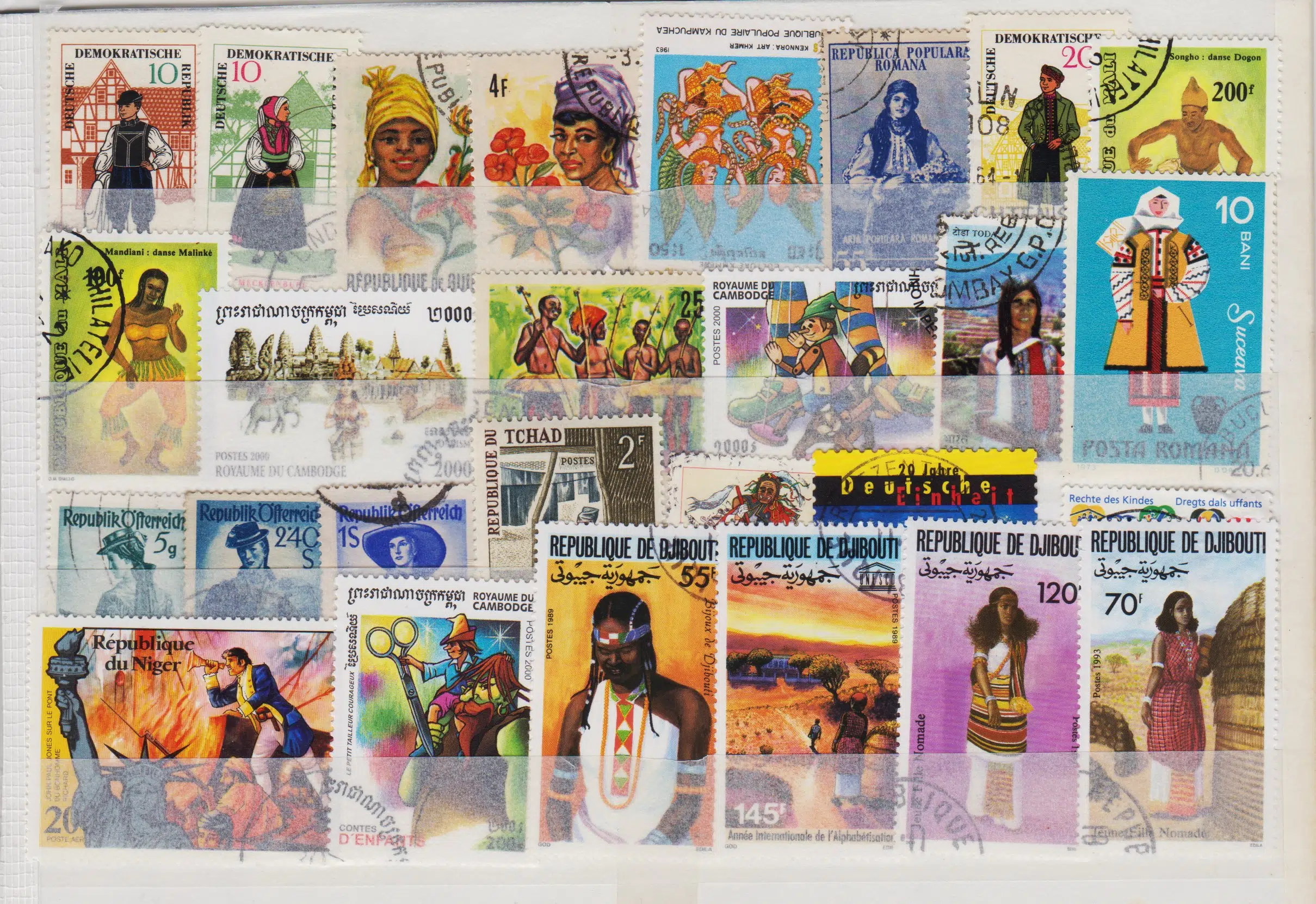 27 ÇEŞİT YABANCI DAMGALI PUL. AFRİKA-AVRUPA-ASYA. KARTELASINDA.