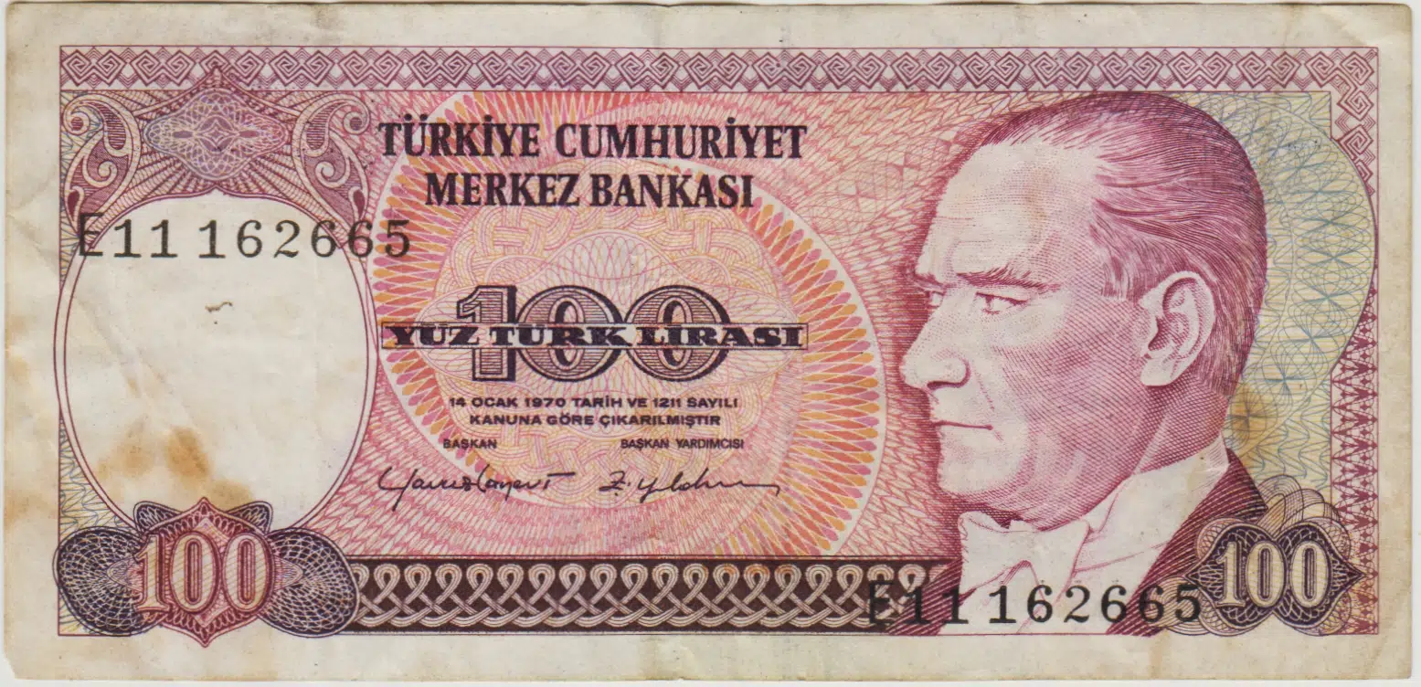 7. EMİSYON 2. TERTİP 100 LİRA E11 NADİR SERİ. LEKELİ ÇOK TEMİZ.