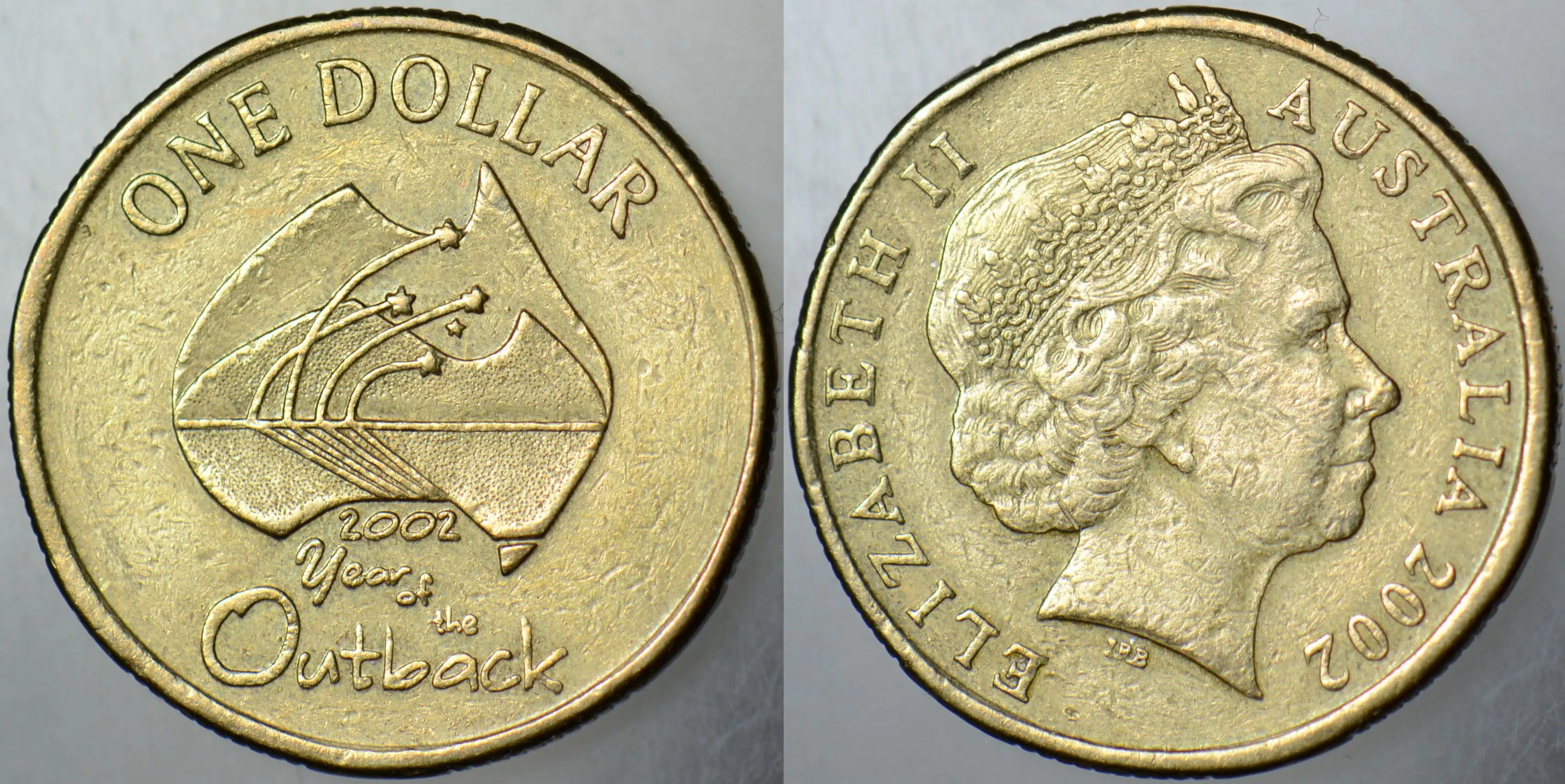 AVUSTRALYA 1 DOLAR 2002 SİRKÜLASYON HATIRA-ÇÖL BÖLGESİ YILI. KRALİÇE II. ELİZABETH.